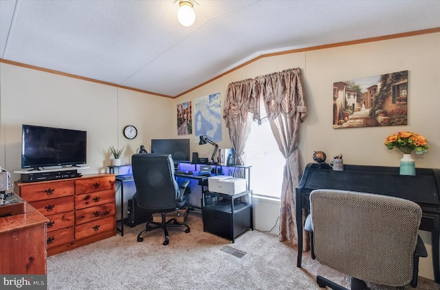 carpeted home office featuring ornamental molding and lofted ceiling