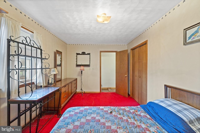 621 Gay St, Hanover, PA 17331 - carpeted bedroom with a textured ceiling, a closet, and baseboards