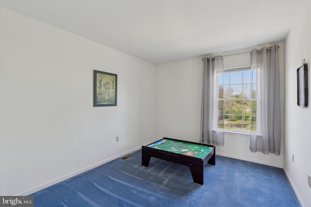 game room with carpet flooring, baseboards, and visible vents