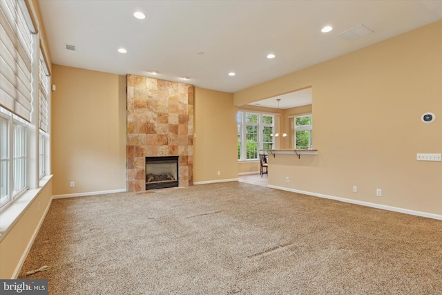 137 Mahogany Way, Upper Gwynedd, PA 19446 - unfurnished living room with recessed lighting, carpet flooring, a tiled fireplace, and baseboards