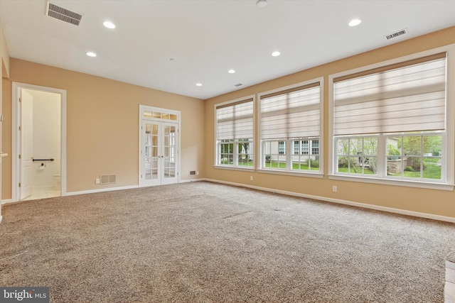 137 Mahogany Way, Upper Gwynedd, PA 19446 - empty room featuring french doors, carpet flooring, recessed lighting, and baseboards