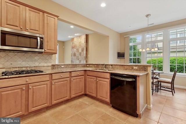 137 Mahogany Way, Upper Gwynedd, PA 19446 - kitchen with black dishwasher, stainless steel microwave, a sink, healthy amount of natural light, and recessed lighting