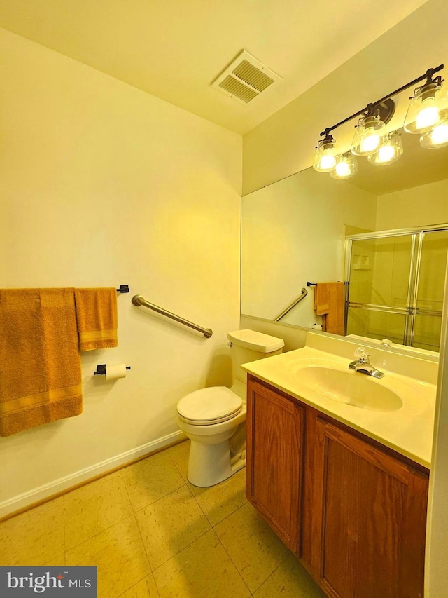 6620 Lake Park Dr Unit 2D 201, Greenbelt, MD 20770 - full bath featuring a shower stall, toilet, vanity, and tile patterned flooring