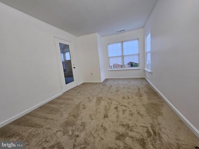 6620 Lake Park Dr Unit 2D 201, Greenbelt, MD 20770 - carpeted empty room with plenty of natural light and baseboards