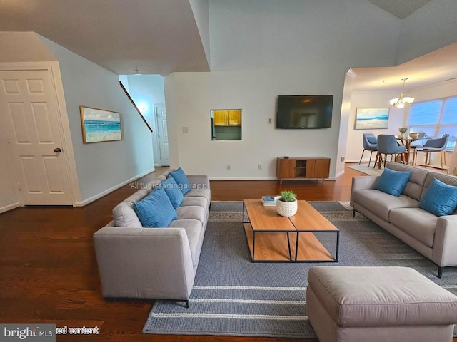 6620 Lake Park Dr Unit 2D 201, Greenbelt, MD 20770 - living room with a chandelier, wood finished floors, and baseboards