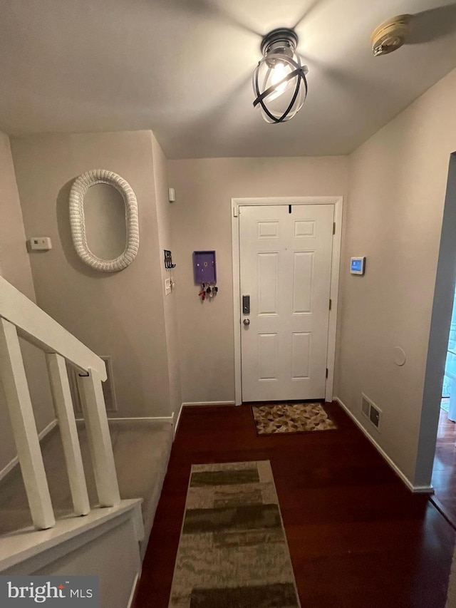 7918 Bentley Village Dr Unit 14A, Springfield, VA 22152 - entryway with baseboards, stairway, visible vents, and wood finished floors