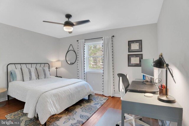 2019 Pemberton St, Philadelphia, PA 19146 - bedroom with wood finished floors, an office area, ceiling fan, and baseboards