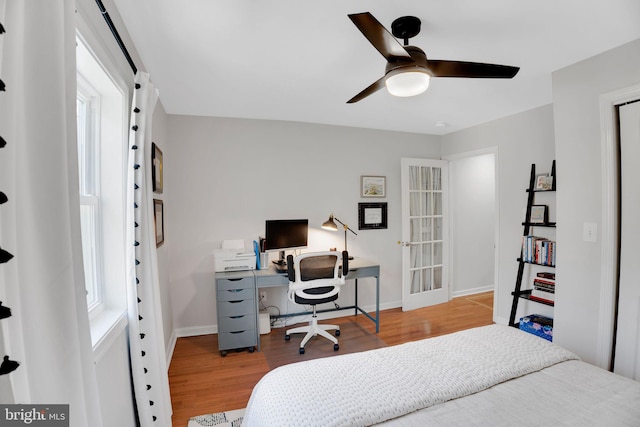 2019 Pemberton St, Philadelphia, PA 19146 - bedroom with wood finished floors, baseboards, a desk, and ceiling fan