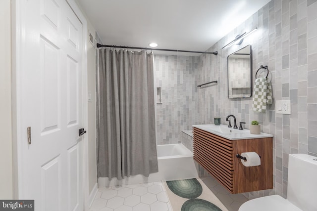 2019 Pemberton St, Philadelphia, PA 19146 - full bath featuring tile walls, tile patterned flooring, shower / tub combo with curtain, toilet, and vanity