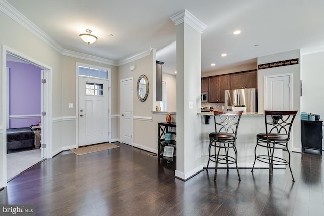 12815 Breyer Pl, Hughesville, MD 20637 - entryway featuring crown molding, dark wood finished floors, and baseboards