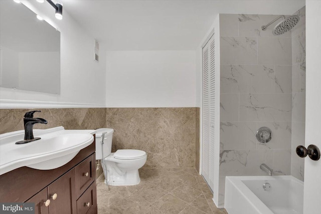 3709 S George Mason Dr Unit 1109E, Falls Church, VA 22041 - full bathroom featuring wainscoting, bathtub / shower combination, vanity, toilet, and tile walls