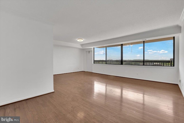 3709 S George Mason Dr Unit 1109E, Falls Church, VA 22041 - unfurnished room featuring baseboards and wood finished floors