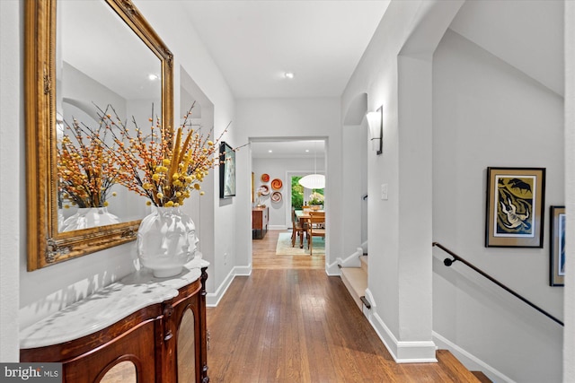 2871 Audubon Ter NW, Washington, DC 20008 - hallway with baseboards, hardwood / wood-style floors, recessed lighting, and arched walkways
