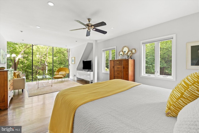 2871 Audubon Ter NW, Washington, DC 20008 - bedroom with wood finished floors, a ceiling fan, and recessed lighting