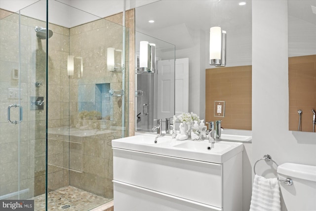 2871 Audubon Ter NW, Washington, DC 20008 - full bathroom with a sink, double vanity, toilet, and a shower stall