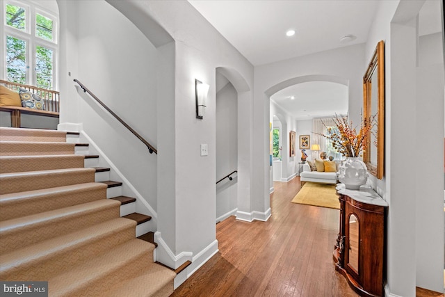 2871 Audubon Ter NW, Washington, DC 20008 - foyer entrance with wood-type flooring, plenty of natural light, arched walkways, and recessed lighting