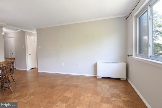 4555 Macarthur Blvd NW Unit 202, Washington, DC 20007 - spare room featuring radiator and crown molding
