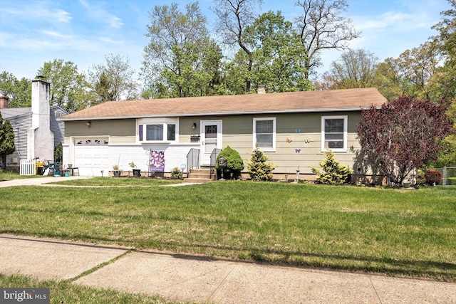 150 Elton Ave, Hamilton, NJ 08620 - single story home with a garage, a chimney, driveway, and a front lawn