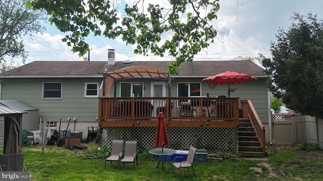 150 Elton Ave, Hamilton, NJ 08620 - rear view of house with a wooden deck, fence, a yard, a pergola, and a shingled roof