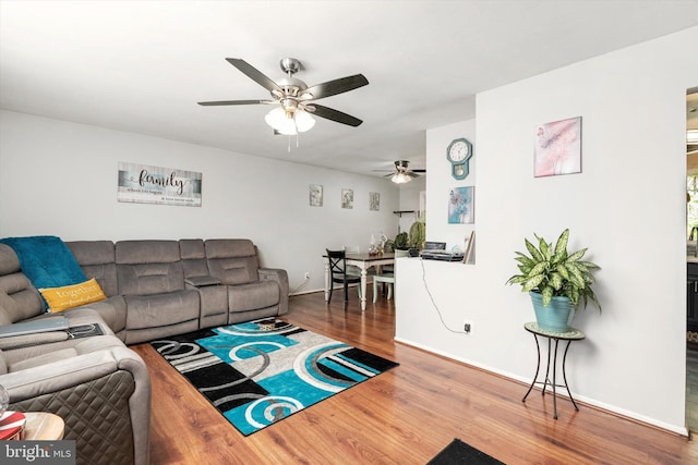 150 Elton Ave, Hamilton, NJ 08620 - living room featuring baseboards, ceiling fan, and wood finished floors