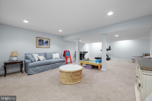 carpeted living room featuring recessed lighting and baseboards