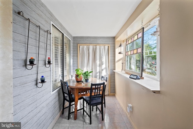 dining room featuring baseboards