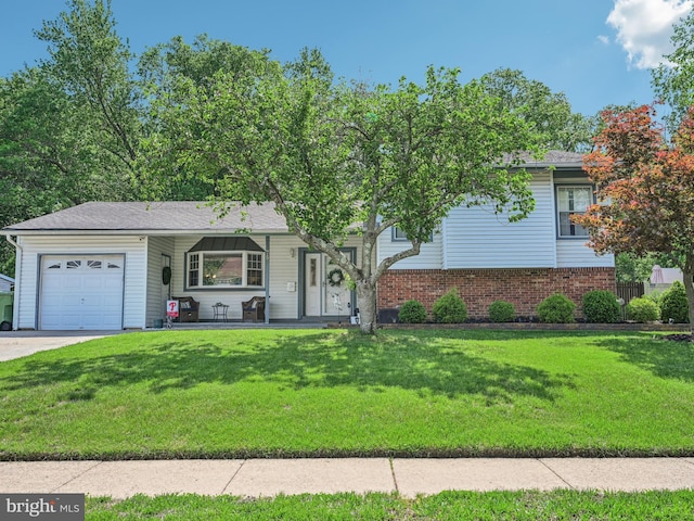 single story home with an attached garage, a front lawn, a porch, and brick siding