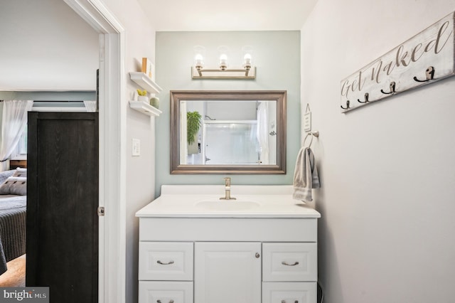 full bathroom with vanity and ensuite bathroom