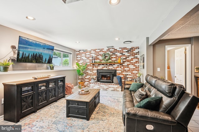 living room with recessed lighting and light tile patterned floors