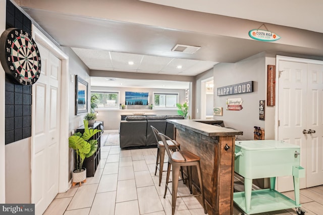kitchen featuring recessed lighting and light tile patterned flooring