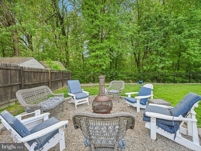 view of patio featuring an outdoor fire pit