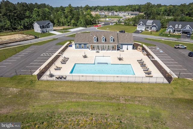 view of pool featuring a patio, fence, and a fenced in pool
