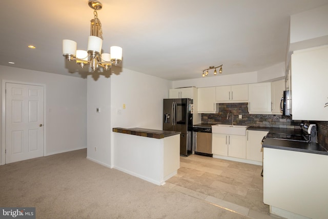 229 Keats Ct, Sicklerville, NJ 08081 - kitchen featuring stainless steel appliances, dark countertops, tasteful backsplash, a chandelier, and recessed lighting