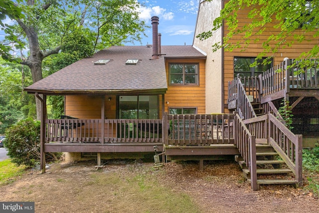 229 Keats Ct, Sicklerville, NJ 08081 - back of property featuring a shingled roof, a deck, and stairway