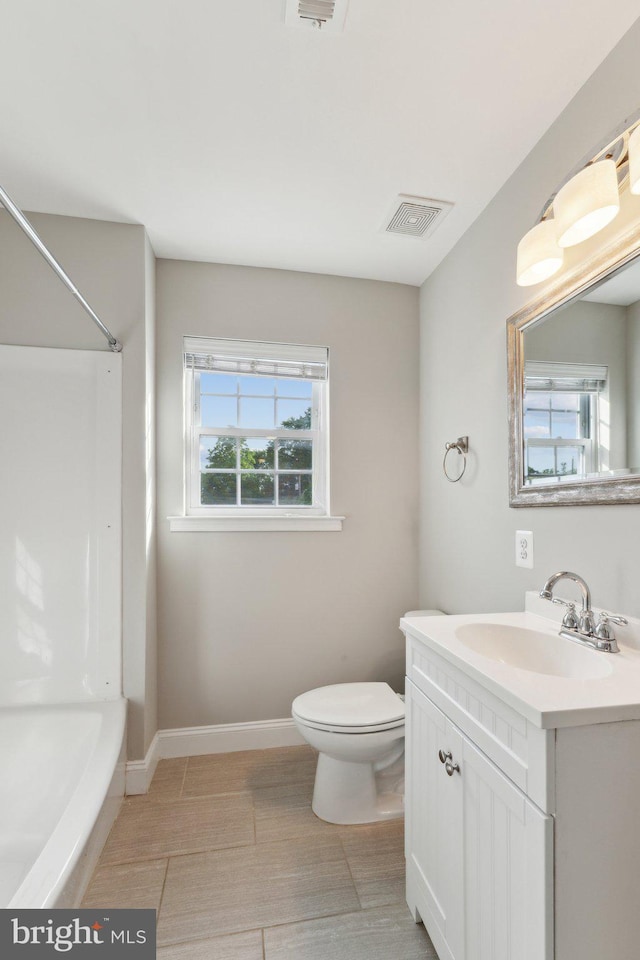 1600 Ballinger Ave, Landover, MD 20785 - full bath featuring toilet, vanity, and baseboards