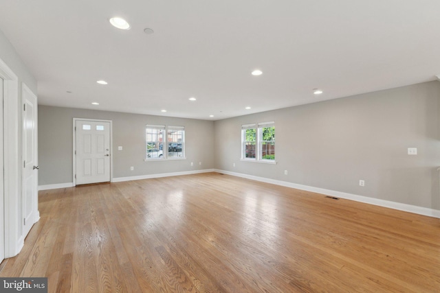 1600 Ballinger Ave, Landover, MD 20785 - unfurnished living room featuring recessed lighting, light wood-style flooring, and baseboards