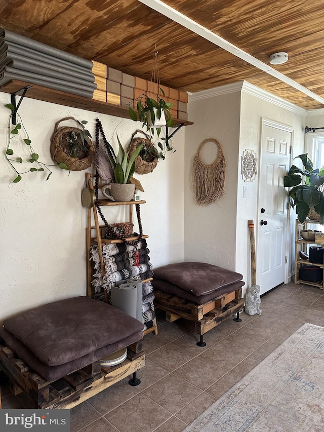 mudroom featuring wooden ceiling, ornamental molding, and tile patterned flooring