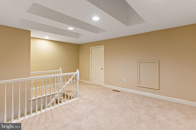 unfurnished room featuring baseboards, light carpet, recessed lighting, and visible vents