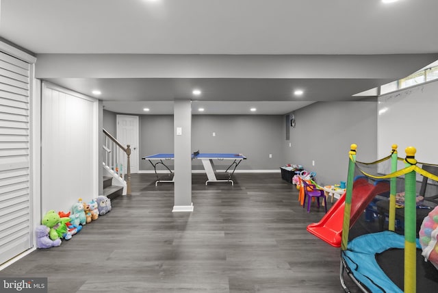 game room featuring recessed lighting, baseboards, and wood finished floors