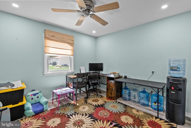 office featuring recessed lighting, ceiling fan, and wood finished floors