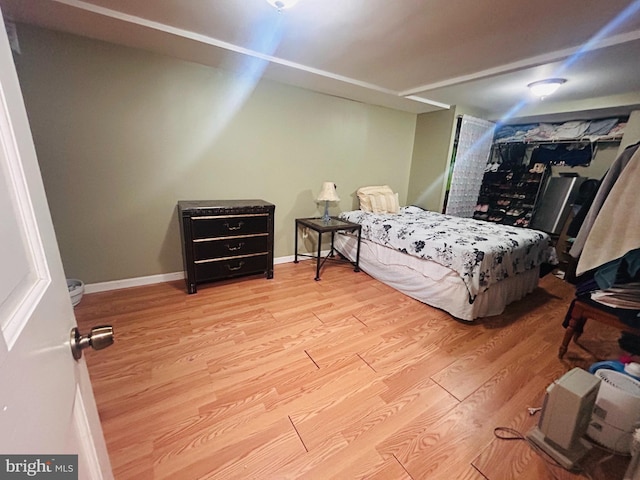421 52nd St, Baltimore, MD 21224 - bedroom featuring wood finished floors and baseboards