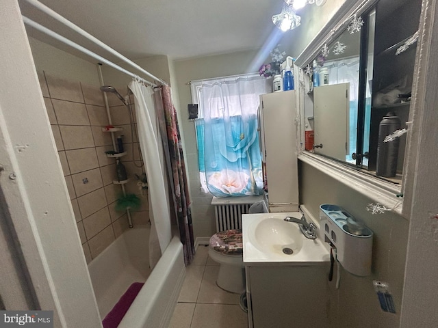 421 52nd St, Baltimore, MD 21224 - bathroom featuring radiator, tile patterned flooring, shower / bath combo with shower curtain, vanity, and toilet