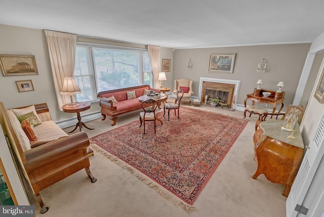living area with baseboards, ornamental molding, carpet flooring, and a baseboard heating unit