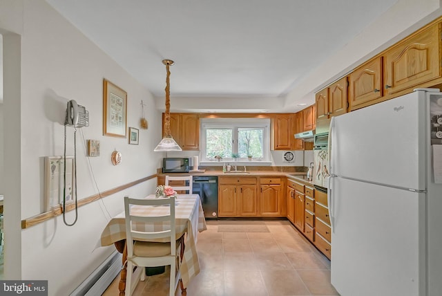 kitchen featuring a sink, light countertops, freestanding refrigerator, under cabinet range hood, and dishwashing machine