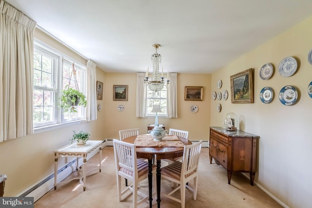 dining space featuring light colored carpet, baseboards, a baseboard heating unit, and an inviting chandelier
