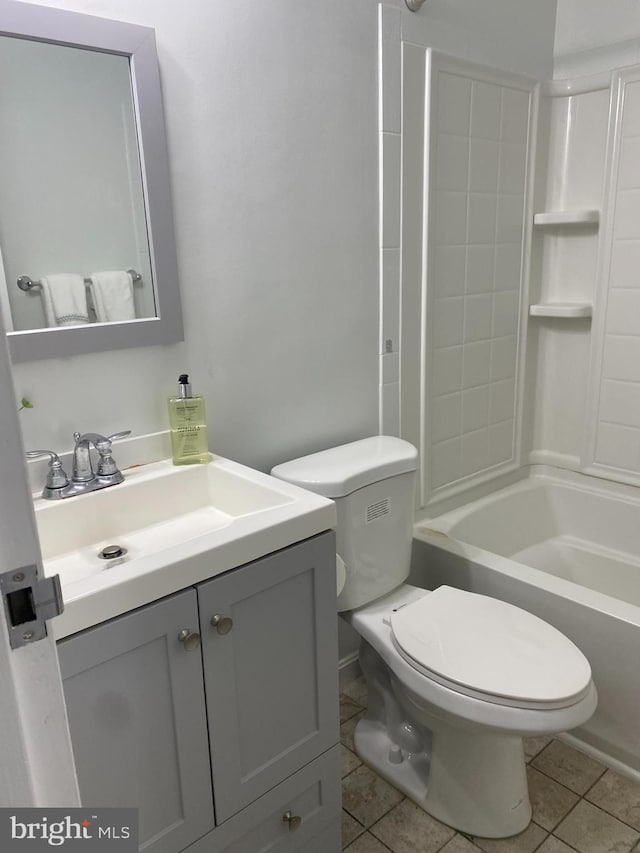 full bath with toilet, shower / tub combination, tile patterned flooring, and vanity
