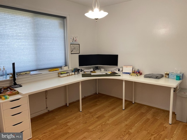 home office featuring light wood-style flooring