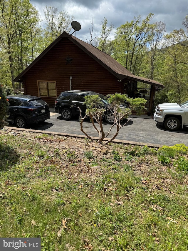 view of side of property featuring log exterior