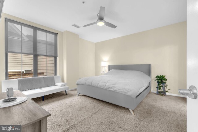 444 W Broad St Unit 407, Falls Church, VA 22046 - carpeted bedroom featuring baseboards and ceiling fan