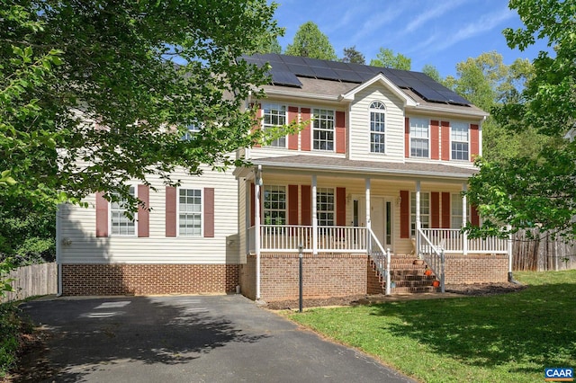 2364 N Chesterfield Ct, Charlottesville, VA 22911 - colonial house featuring a porch, solar panels, asphalt driveway, and stairs